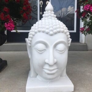 large white buddha head garden statue